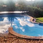 Hebert - Itabirito (Construção de piscina decorativa em pedras com borda infinita)